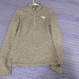 North face jacket. Like a white beige gray color